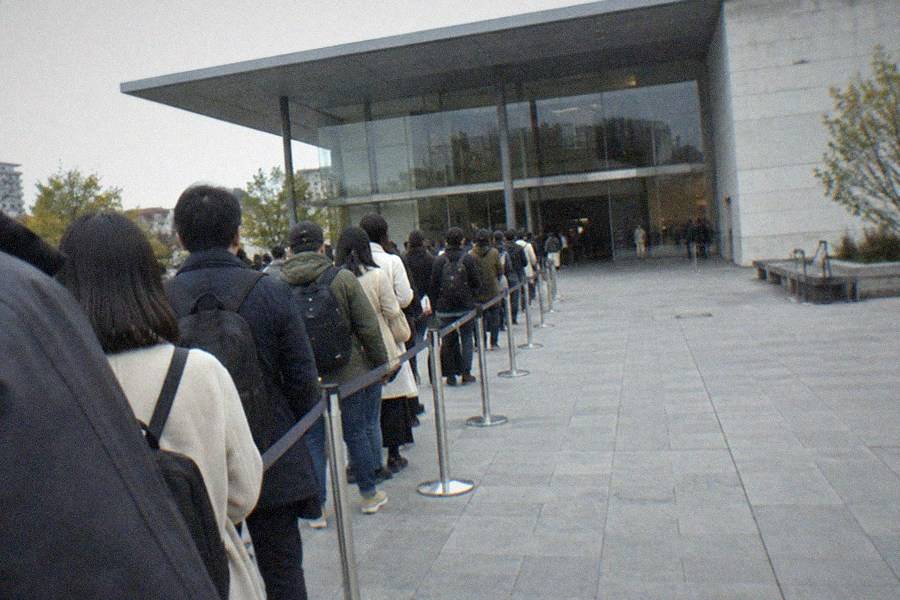 Museum ticket counters in a bright entrance lobby