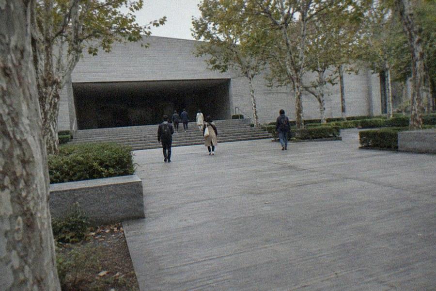 Visitors walking through the sculpture gallery of The National Museum of Western Art in Ueno Park